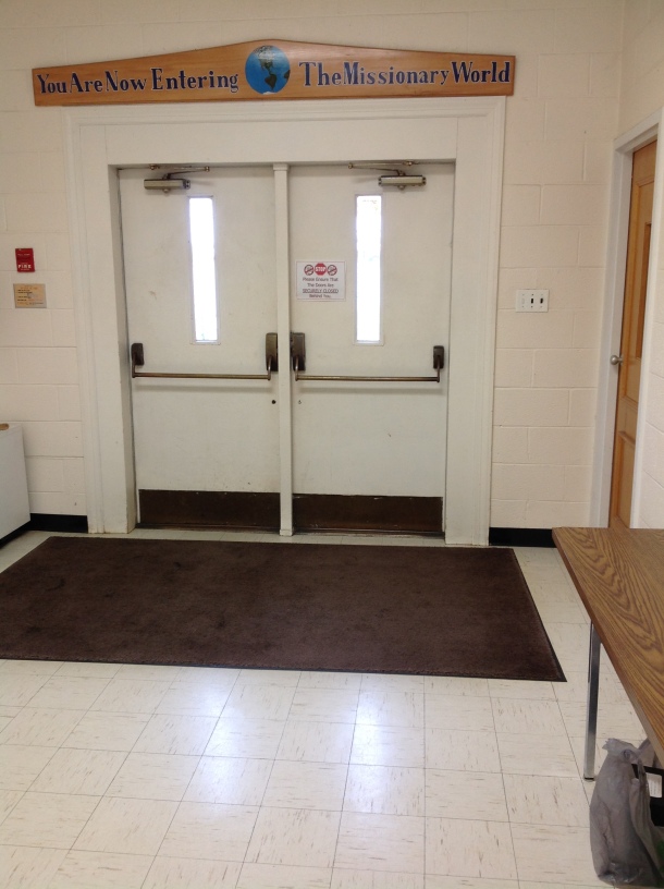 DIW sits in hallway near door.jpg